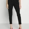 ONLY Petite ONLPOPTRASH EASY - Trousers - Black -ONLY Petite store 48e4f81ba5f94f9190f6b792261cfa0c