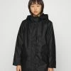 ONLY Petite ONLSALLY RAINCOAT - Waterproof Jacket - Black -ONLY Petite store a1db60103b9845bc8cb713718f64b663